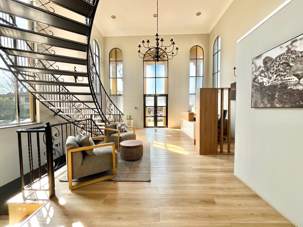 Double-height atrium with arched windows