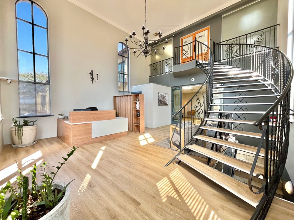 Reception and sweeping staircase at The Chambers
